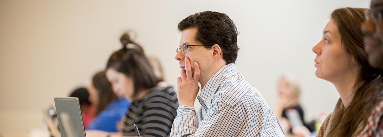 A student listens as Dr. Jason Chow teaches a class in the Department of Counseling and Special Education.