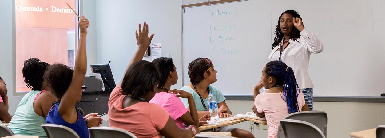 Instructor in class with students.