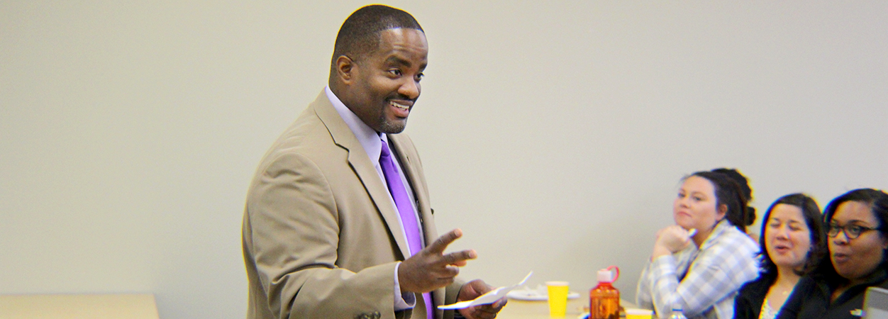 Dean Andrew Daire speaks to a group in the VCU School of Education's Oliver Hall.