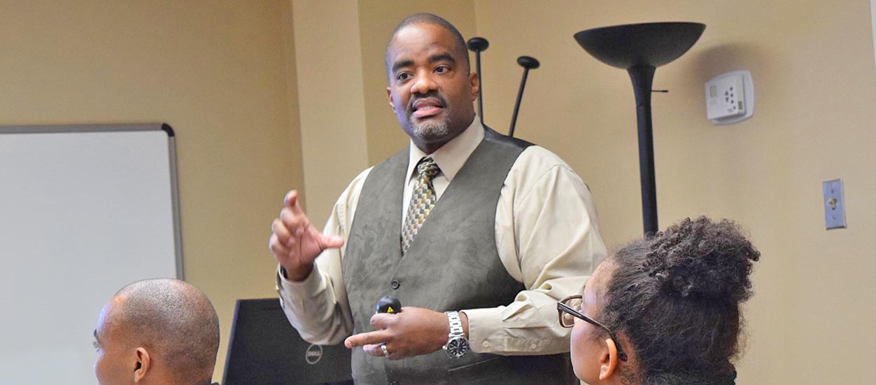 Dean Andrew Daire addresses the VCU Holmes Scholars in Oliver Hall this past January, prior to the COVID-19 pandemic.