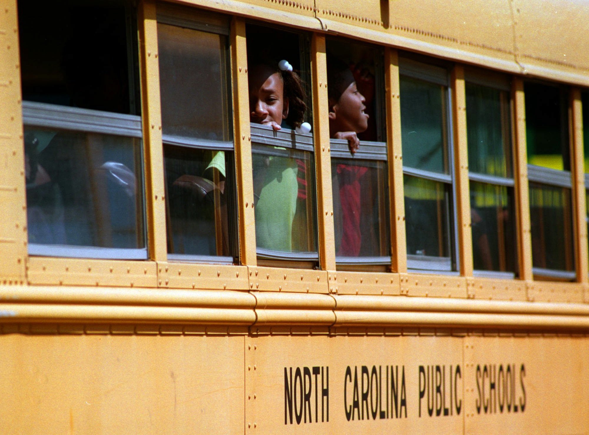 Schoolchildren in Huntersville, N.C., a suburb of Charlotte, in 1999. Two years later, a court order ended a comprehensive desegregration plan in the Charlotte school district that included busing. (Todd Sumlin/The Charlotte Observer)