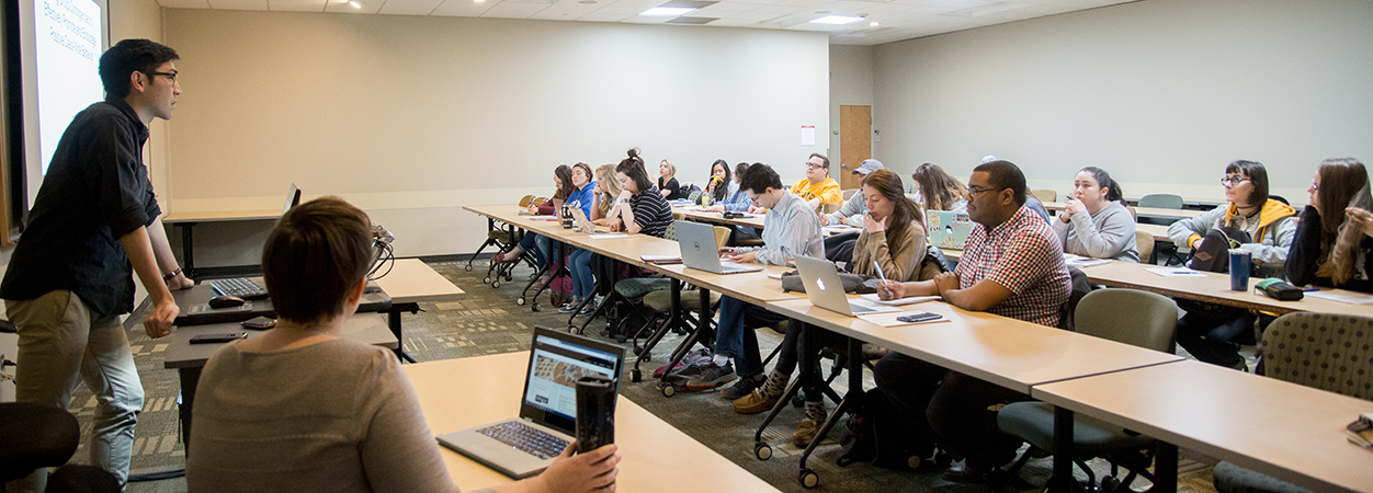 Assistant professor Jason Chow teaches a class in Oliver Hall.