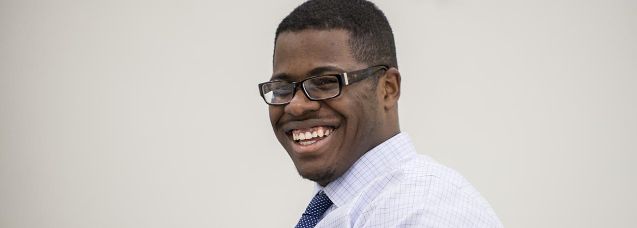 A VCU School of Education student smiles during class in Oliver Hall.